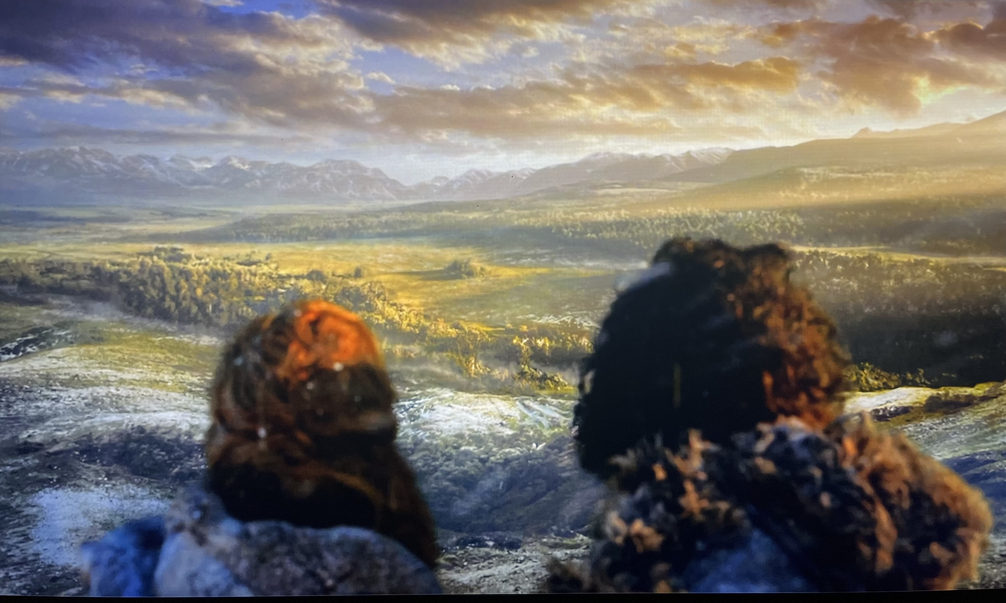 Jon Snow and Ygritte looking over Westeros after they climbed the wall